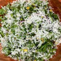 Arugula Salad · Lemon honey dressing, candied pistachios, Parmesan, red onions. Vegetarian.