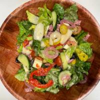 Dumpster Gems Salad · Chopped greens, provolone, salami, cucumbers, cherry tomato, pepperoncini, hearts of palm, o...