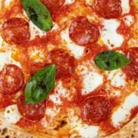 Diavola Pizza · WITH TOMATOES, HOT SALAMI
AND MOZZARELLA