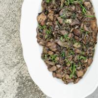 Funghi Side · SAUTEED MUSHROOMS, COOKED IN
BUTTER GARLIC AND HERBS