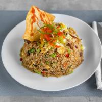 Chaufa de Camarones · Peruvian styled fried rice with red bell peppers, scallions, garlic, soy sauce, scrambled eg...