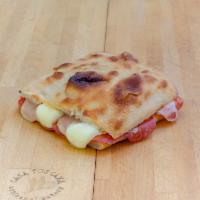 Spicy Bombastic, Hot and Fantastic Sandwich · Spicy Italian salame, melted fontina cheese and fresh mozzarella fiordilatte.