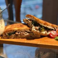 Smart Skater's Diet Sandwich · Super juicy Tuscan sausage, fresh creamy burrata cheese, sauteed broccoli rabe and extra vir...
