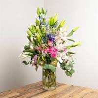 Deluxe Arrangement  · An extravagant luxurious arrangement of seasonal flowers.