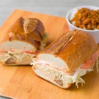 Chimi Res · Beef Dominican sandwich. Served with rice and beans or green or yellow plantains or french f...