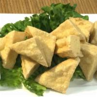 A2. Tofu Triangles · Fried tofu /sweet chili dip/ ground peanut