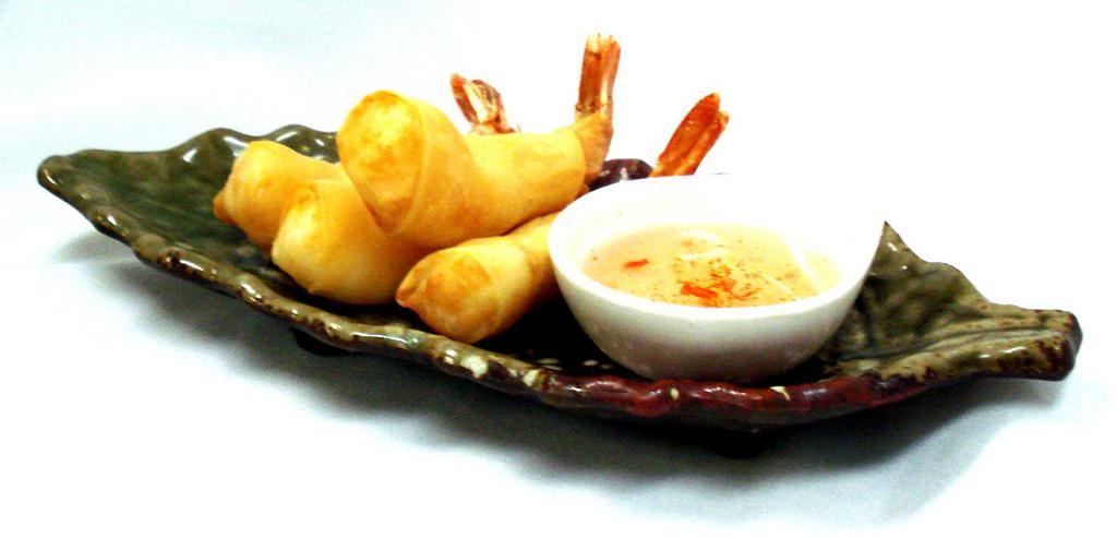 A3. Golden Shrimp · Crispy Shrimp Roll / scallion /wrapped in egg roll skin / plum sauce