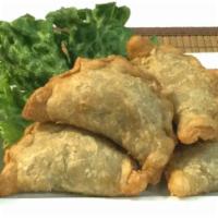 A4. Curry Puff · Chicken / onion / potato / curry powder / stuffed in pastry dough / cucumber sauce
