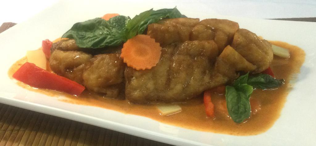 SF2. Pla Kang Dang · Crispy Filet  Fish in red curry / coconut milk / bamboo shoots / carrot / bell pepper / peas / basil leaves
