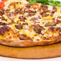 9. The Bull Rider Pizza · BBQ chicken. Chicken, sausage, breakfast bacon and fresh pineapple with our chipolte lime BB...