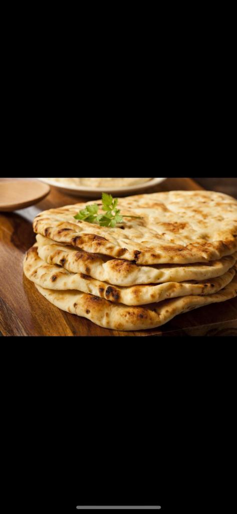 Naan ·  1 piece of oven-baked flat bread.