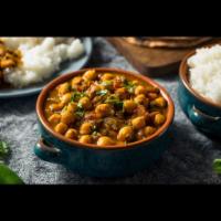 Channa Masala · Chickpeas with tomato, onion, and spices.