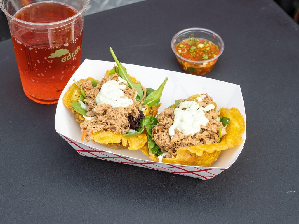 Beef Patacon · 2 Savory fried plantain cups with our seasoned shredded beef, mozzarella cheese, mixed greens and our signature salsa on the side.