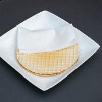 Oblea · 2 thin wafers made of garbanzo flour spread with 