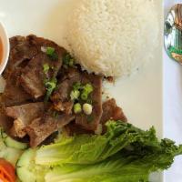 28. BBQ Beef · White rice, BBQ beef, and vegetables.