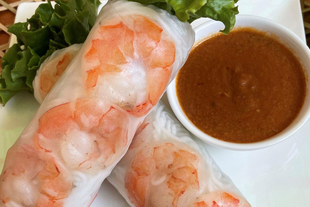 A4. Shrimp Spring Roll (2) · Shrimp, lettuce, pickled carrot and daikon, cucumber, mint, and vermicelli.