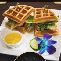 Chicken and Waffles · Sugar N Coals twist on a southern classic. Chicken tenders served on house made waffles with...