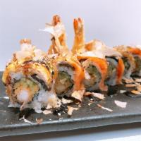 L ion King Roll · Shrimp tempura ,cheese & cucumber inside.
Eel ,avocado & bonito on top.
W. eel sauce