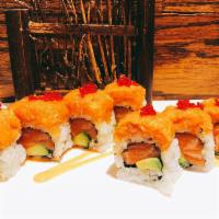 Salmon Lover Roll · Spicy Salmon, avocado inside and top with spicy salmon & tobiko.