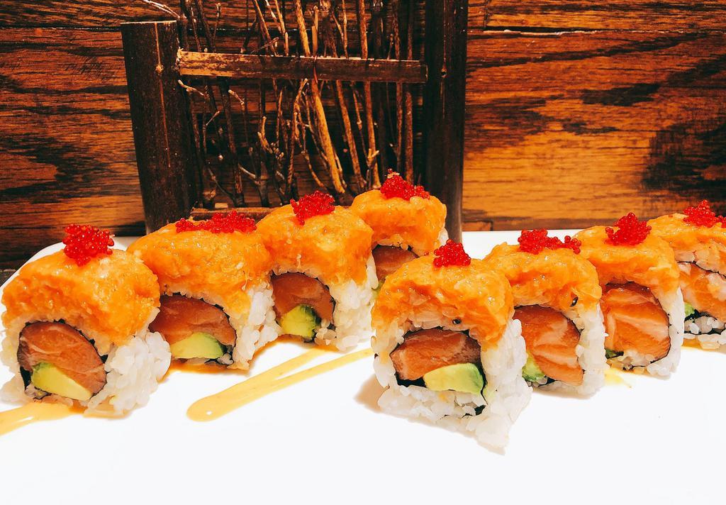 Salmon Lover Roll · Spicy Salmon, avocado inside and top with spicy salmon & tobiko.