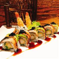 Crazy Dragon · Shrimp tempura, seaweed salad inside, top with eel and avocado, served with eel sauce