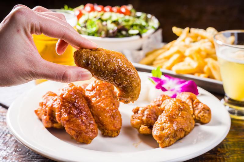  Signature Wings · Our signature chicken is fried with our special technique
giving it an amazing crunch. Our sauces are always brushed on
by hand.