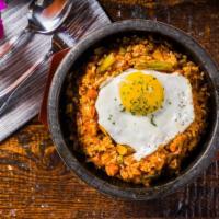 Kimchi Fried Rice · Pan-fried white rice with kimchi, sausage(pork), vegetable and
sunny side up egg