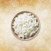 Steamed Basmati Rice  · Our long grain aromatic basmati rice, steamed to perfection 
