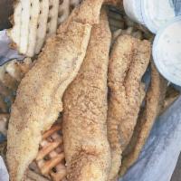 Catfish Basket · Golden Crispy fillets fried to perfection, serve with seasoned waffle fries that will have y...