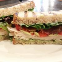 Turkey, Bacon and Avocado Sandwich · Pesto mayo, roasted peppers. Dressings, sauces and spreads are homemade.