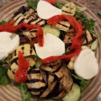 Tuscan Salad · Grilled vegetables, fresh mozzarella and roasted peppers.