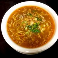 Spicy Noodle Soup · Egg noodles with minced pork in a spicy, sweet and tangy pork broth. Topped with fresh bean ...