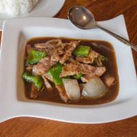 Pepper Steak · Stir fried marinated sliced tender beef with bell peeper and onion in house brown sauce. Ser...