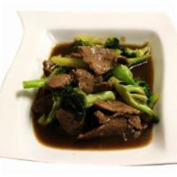 Beef with Broccoli · Stir fried marinated sliced tender beef with broccoli in house brown sauce. Served with choi...