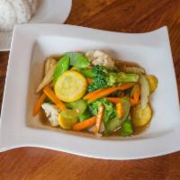 Mix Vegetables with Meat · Stir fried assorted vegetables in light brown sauce. Served with choice of protein and choic...
