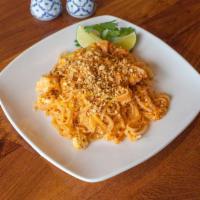 Phad Thai · Traditional Thai stir fried rice noodles using an array of seasoning, crushed chilies, vineg...