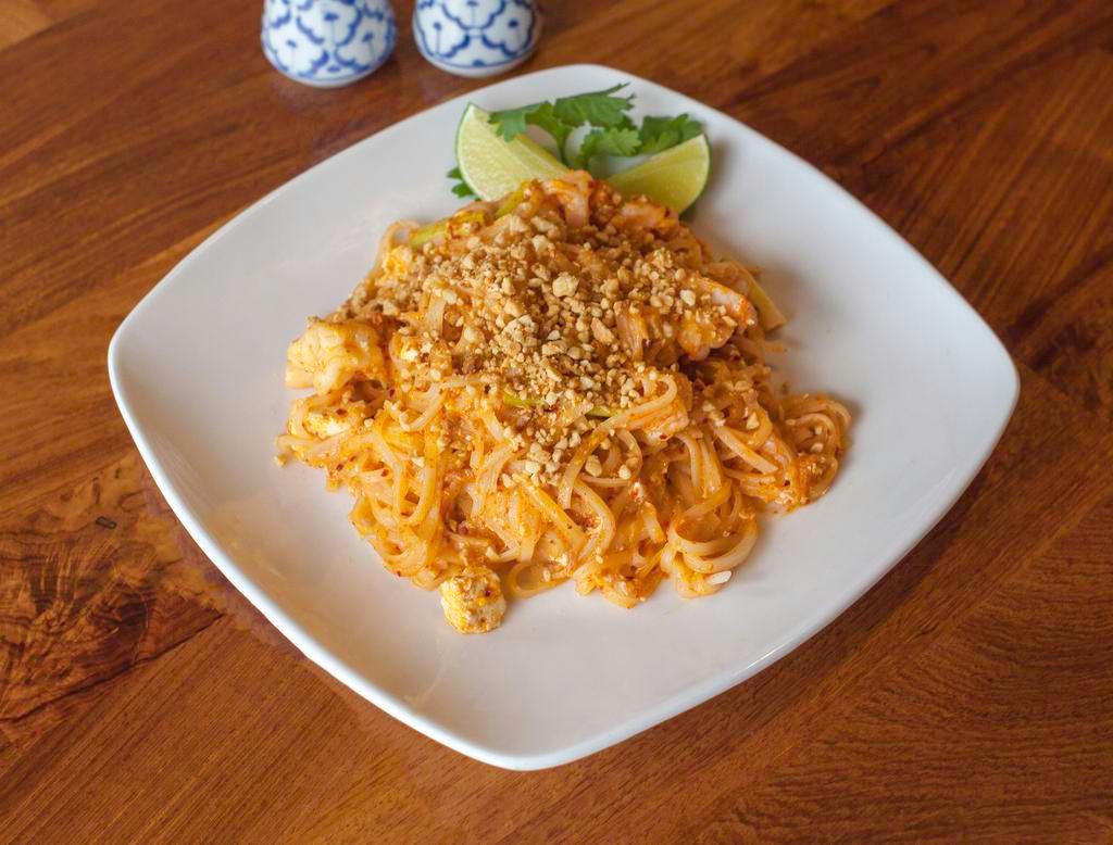 Phad Thai · Traditional Thai stir fried rice noodles using an array of seasoning, crushed chilies, vinegar, tofu, bean sprouts, egg and green onion. Served with choice of protein. Hot and spicy.