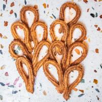 CINNAMON-SUGAR CHURROS · bakers dozen