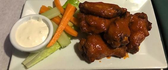 Buffalo Wings · Served with carrots, celery and blue cheese dressing.