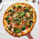 Special White Pizza · Fresh broccoli, spinach, tomatoes, roasted garlic, extra virgin olive oil, mozzarella, and R...