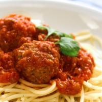 Spaghetti & Meatballs · Spaghetti topped with Pomodoro sauce and meatballs.