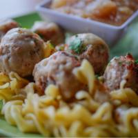 Chicken Apple Meatballs · A savory, sweet combination of ground chicken, chicken sausage and apples in a creamy gravy.