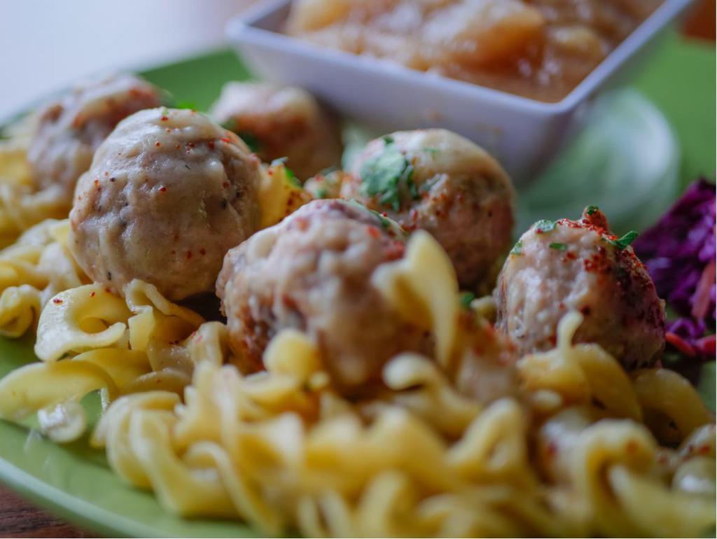 Chicken Apple Meatballs · A savory, sweet combination of ground chicken, chicken sausage and apples in a creamy gravy.