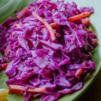 Coleslaw · Light and refreshing cole slaw with red cabbage and carrot tossed in a celery seed dressing....