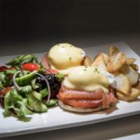 Salmon Eggs Benedict · Poached eggs, salmon, Hollandaise sauce, served on English on engilsh muffin with fries and ...