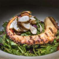 Grilled Octopus Salad · Arugula, tomato, red onion, olives, special chef sauce.