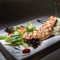 Salmon Fillet · Grilled filled served with mashed potatoes.