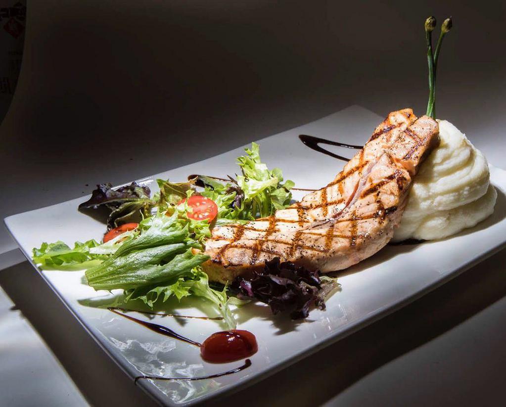 Salmon Fillet · Grilled filled served with mashed potatoes.