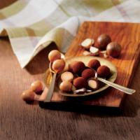 Macadamia Chocolate · Savory macadamia nuts coated with milk chocolate and sprinkled with slightly bitter cocoa po...