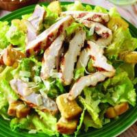 Chicken Caesar Salad · Grilled chicken breast, romaine lettuce, parmesan cheese, croutons and caesar dressing.